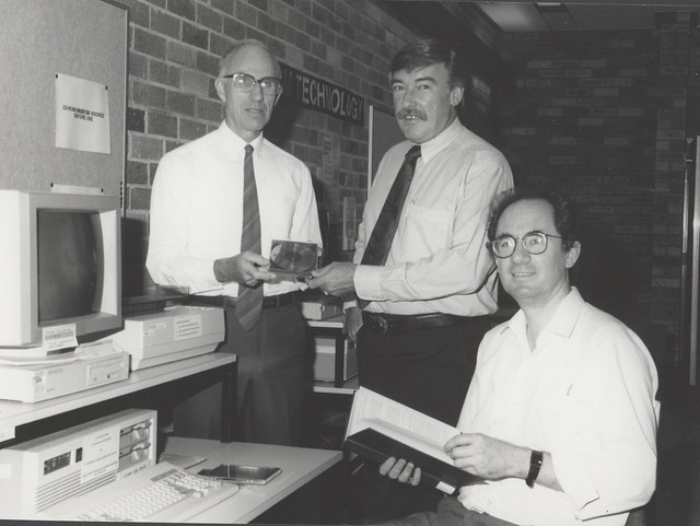 Keith Wilson, Bill Linklater and Jim Cleary, using a CD-ROM (Greek), Auchmuty Library, the University of Newcastle, Australia - 1993