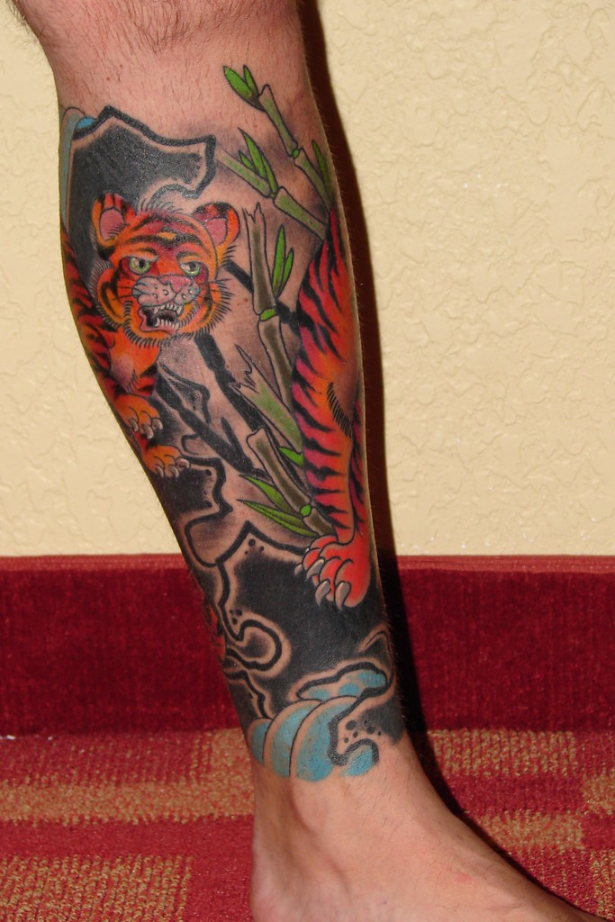 Discover 95+ about tiger leg tattoo latest .vn