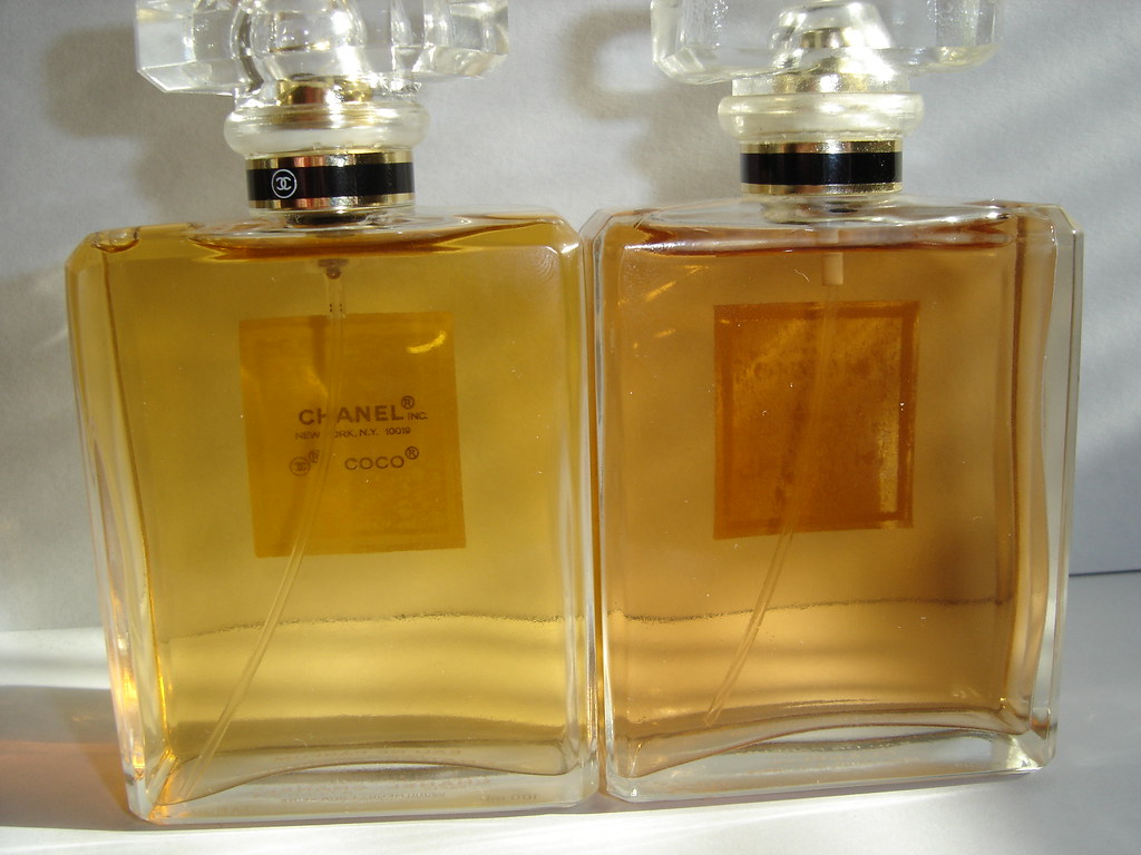 Fake COCO Chanel Bottle (back), Left is authentic, right is…
