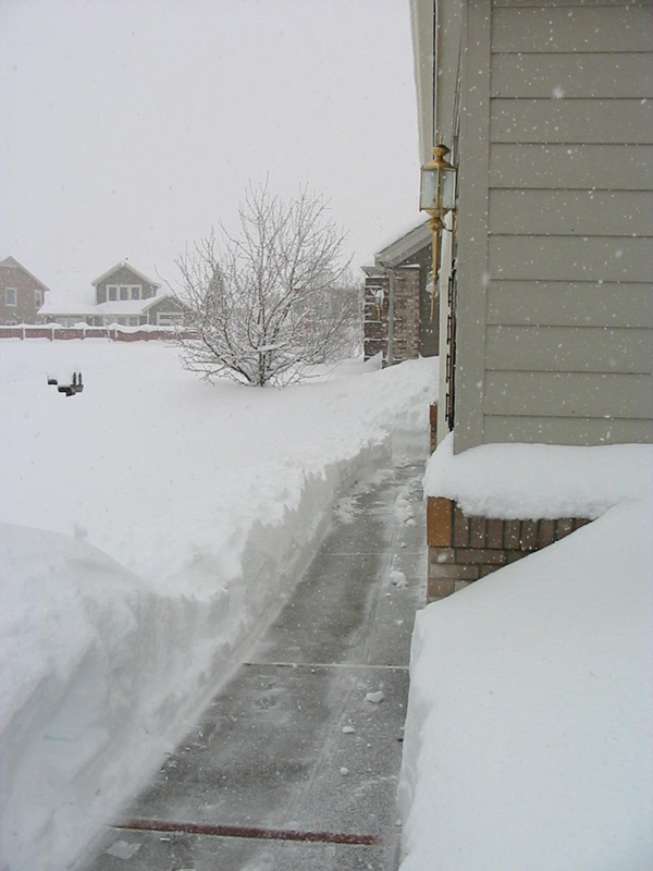 Shoveled snow on driveway