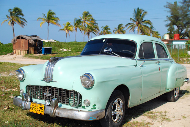 old car by the beach