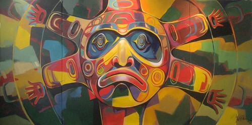 Colourful mask with red lips against interlocking geometric shapes
