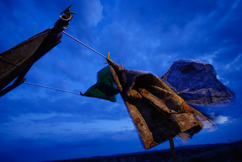 Medinaceli, Soria, Spain. Some clothes moving with the wind. A set of two strobes to freeze/blur the action. Tungsten WB and CTO gels on flash by Nicola Zingarelli, A bit of playing with the strobes around sunset. WB to tungsten and CTO gels on the SB600s. One flas