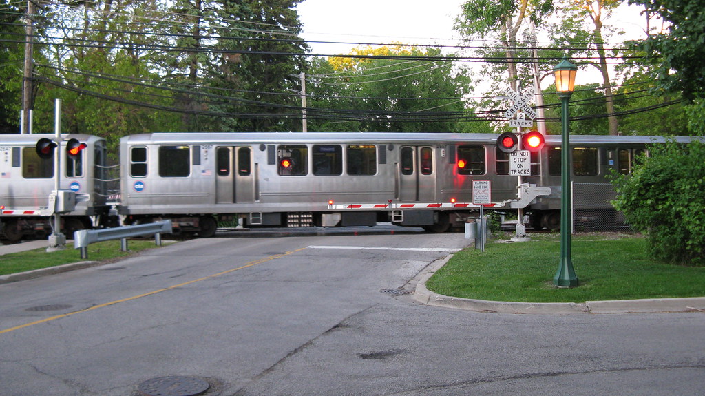 Southbound CTA purple line train departing from the Linden Avenue Terminal. Wilmette Illinois. Early June 2009.