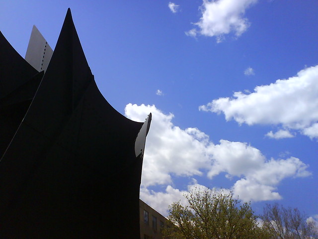 sculpture and clouds