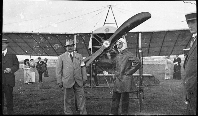 Maurice Guillaux and his Bleriot XI monoplane after the first mail and cargo flight Melbourne-Sydney, 18 July 1914 / photographed by A. J. Perier