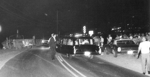 1964 Gross Mortuary black combination heads for hospital from accident scene
