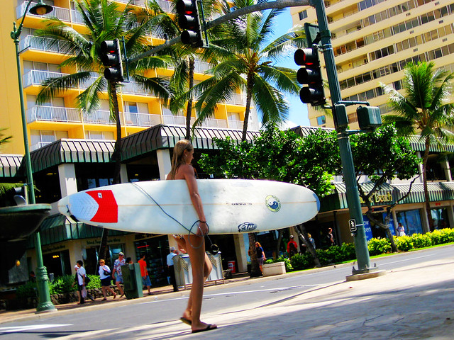 Surf girl on Kalakaua Avenue