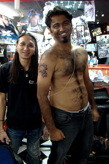 Tip and the slightly fat, hairy, tattooed  Indian BikerBoy