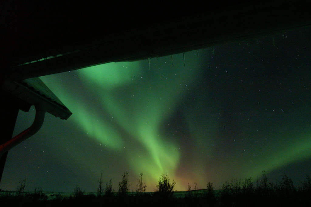 Northern lights at the summer house by Now in Iceland