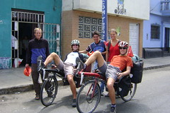 Group pose at Casa de ciclistas as Pius and Stefan leave