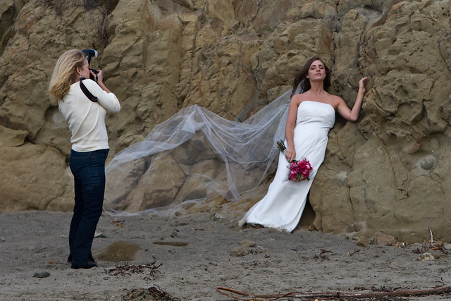 1 of 4 Female wedding photographer on Morro Strand State Beach, Morro Bay, CA