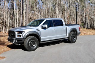 A Heavy Duty Truck Bed Cover On A Ford F150 Raptor