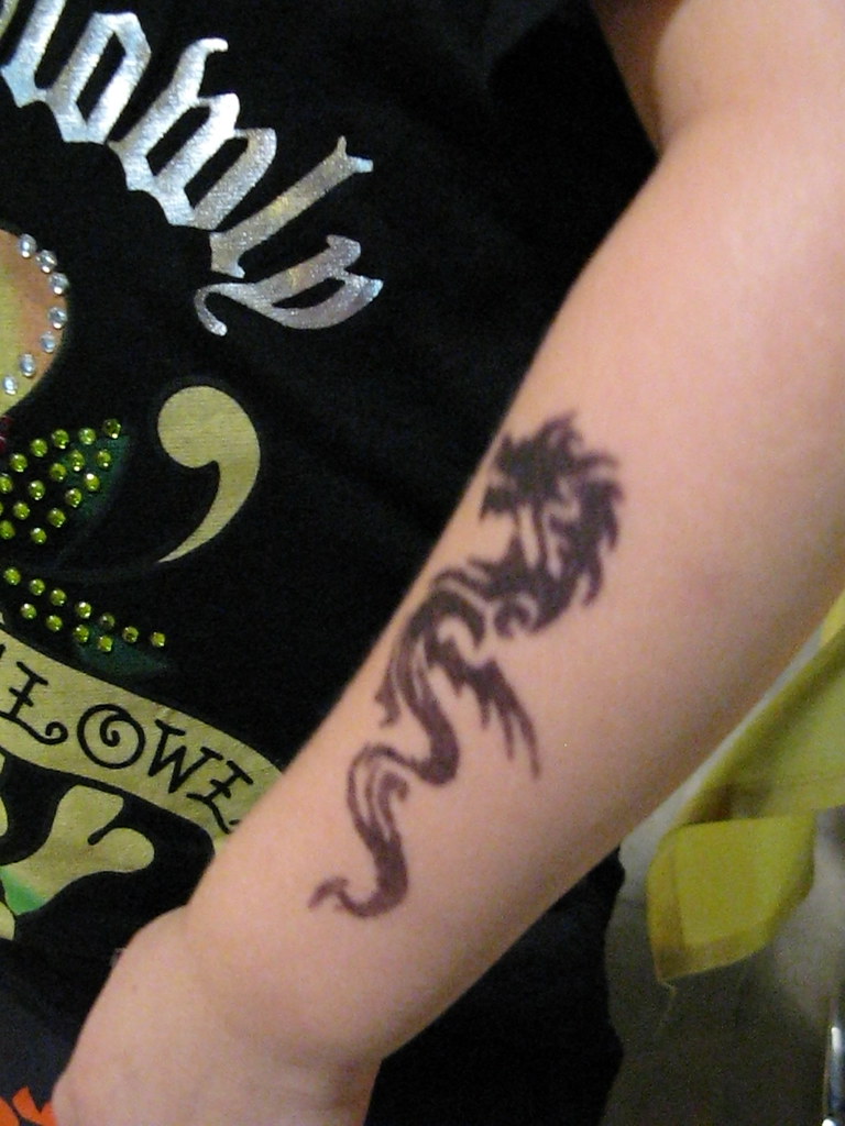 9 Most Stunning Tribal Dragon Tattoo Designs | Styles At Life