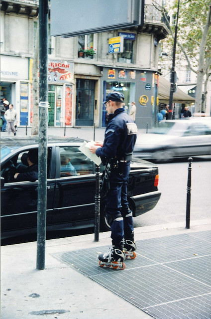 French Roller-blading Policeman, on Inline Skates, Paris, France