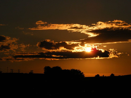 Sunset from the St. Anne Point pedway-3 by catlennox, I love the way the clouds seem to be cradling the sun.sunsets