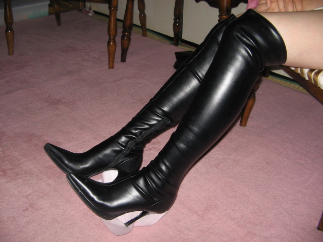 skin tight leather knee high boots