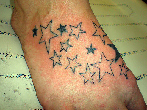 on a male, bunch of stars foot tattoo, what do people thin… | Flickr