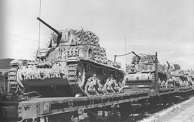 German train laden with PaK 38 AT guns and captured Italian M15/42 tanks