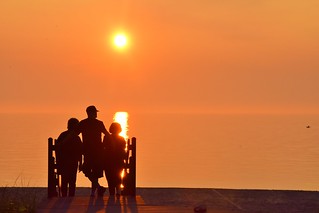 Sunset silhouette - Karin and the Davisons at Sawyer, Michigan beach