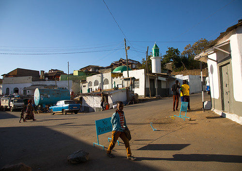 africa africans child colourpicture ethio17018 ethiopia harar horizontal hornofafrica islam islamic landscape market minar mosque muslim people place placeofworship religion rimbaud roofs smallgroupofpeople square taxi town townscape harariregion et