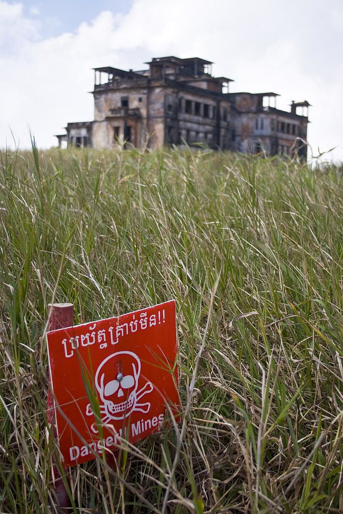 Landmine warning sign at Bokor National Park with the old French