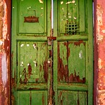 flaky green door