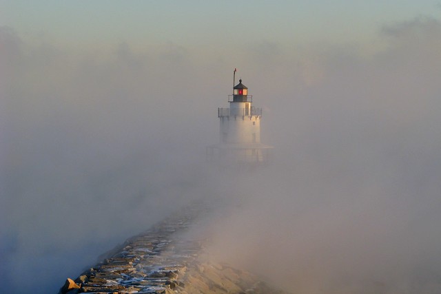 Spring Point Lighthouse surrounded by Arctic sea smoke