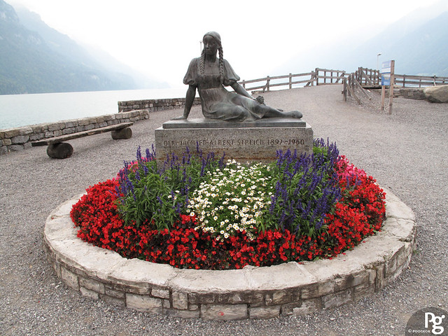 A memorial statue of Dem Dichter Albert Streich 1897 - 1960 on the shore of Brienz Lake