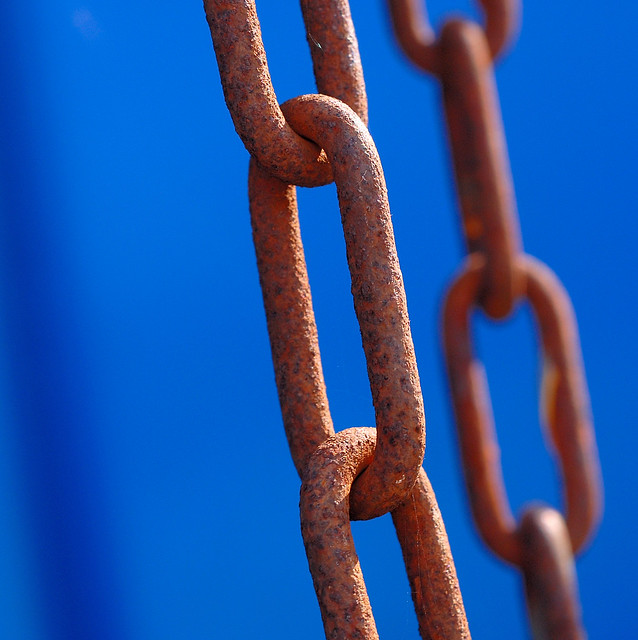 rusty chain on blue