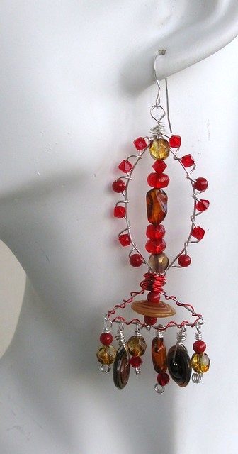 Not Your Everyday Chandeleirs..Swarovski crystals. Baltic Amber. Czech Fire polished Beads. Handblown Artisan glass disks. Red coral