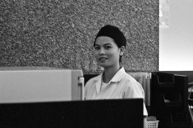 young woman in hat - Bangkok, city of angels
