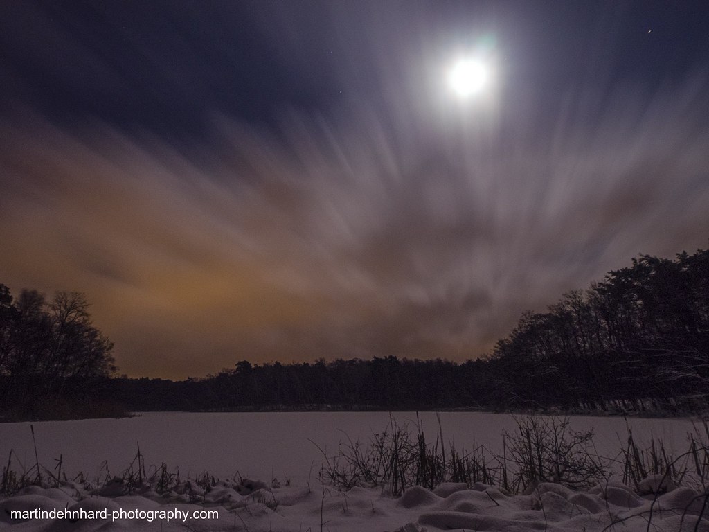Moonlight at the lake following a heavy snow shower