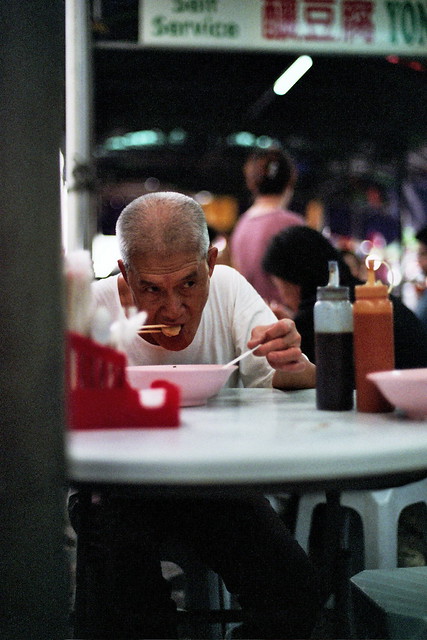 KL Chinatown : A customer enjoying his chee cheong fun & yong tow foo