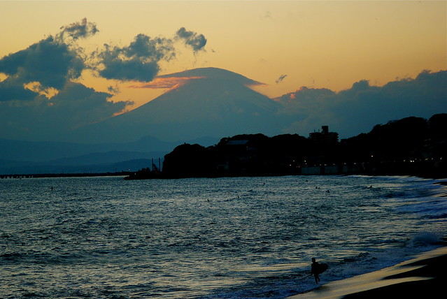 surfer and Fuji with clouds