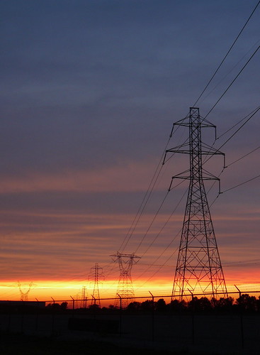 sunset sky lines clouds power towers electricity pylons