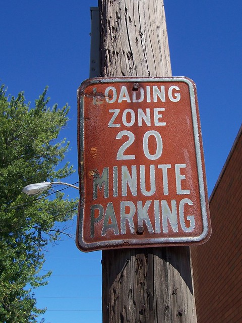 Rusty Loading Zone 20 Minute Parking Sign