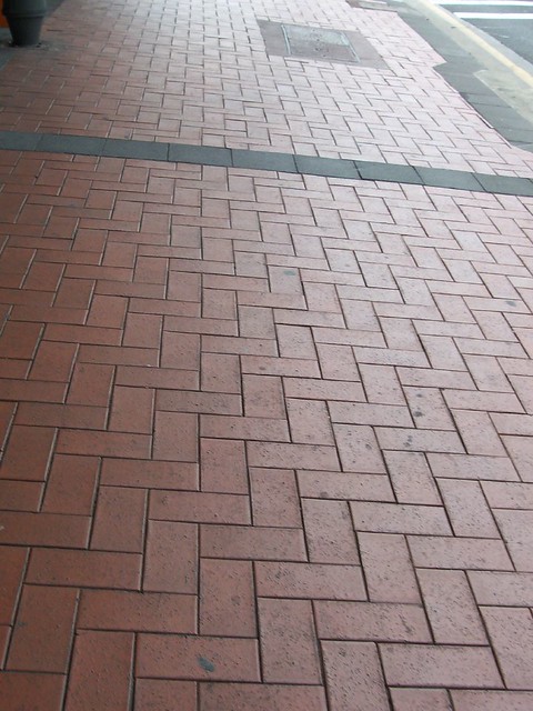 tiled pavement of wollongong mall bus stop