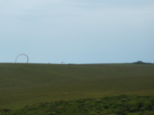 Red Circles Not sure what these were, wobbling over the horizon. Infeasibly large kites, art? seaford - Eastbourne