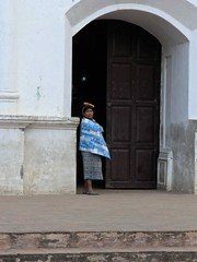 Woman and church door - Mujer en la puerta de la iglesia; San Miguel Chicaj, Baja Verapaz, Guatemala