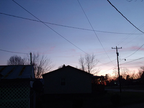 neighbourhood by hachimitsu boro, trees houses sunset sky 2004 silhouette lights evening glow garage powerlines neighbourhood