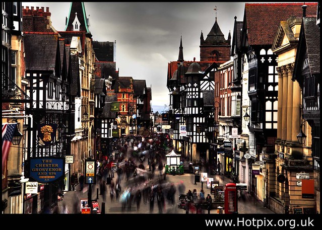 Busy Shoppers In Eastgate, Chester, Cheshire UK, Avoiding Showers