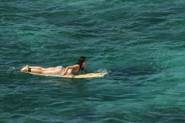 Surfer girl in Maui Enjoying the Ocean
