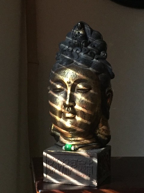 A Bust of a Golden Buddha
