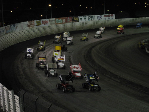2 cars car racetrack race turn track knoxville iowa sprint speedway