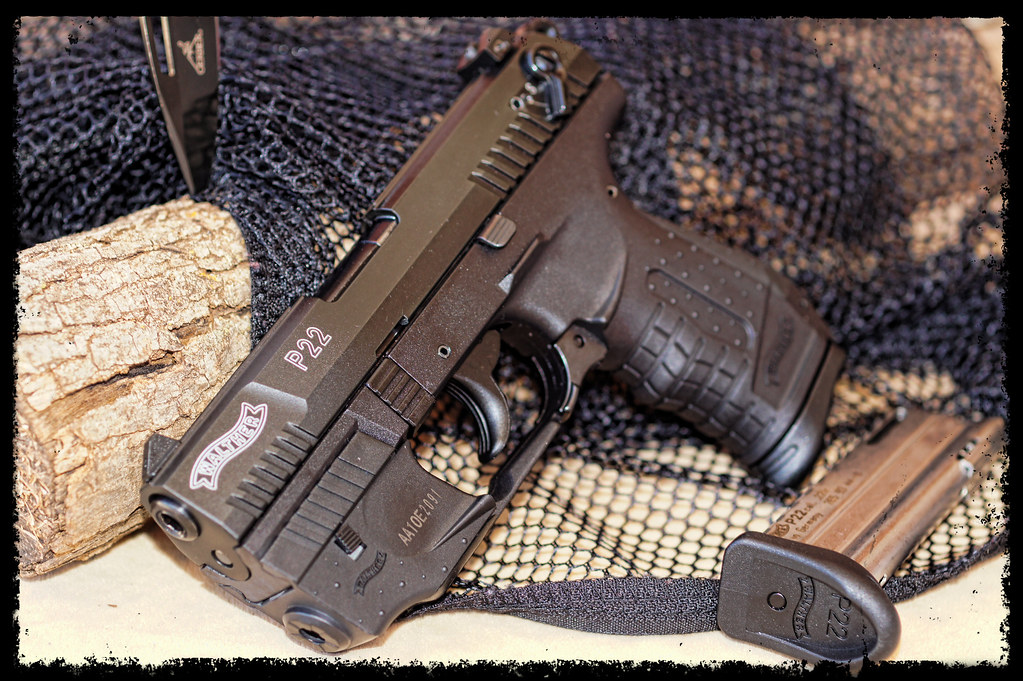 Walther P22 W/ Laser attachment.