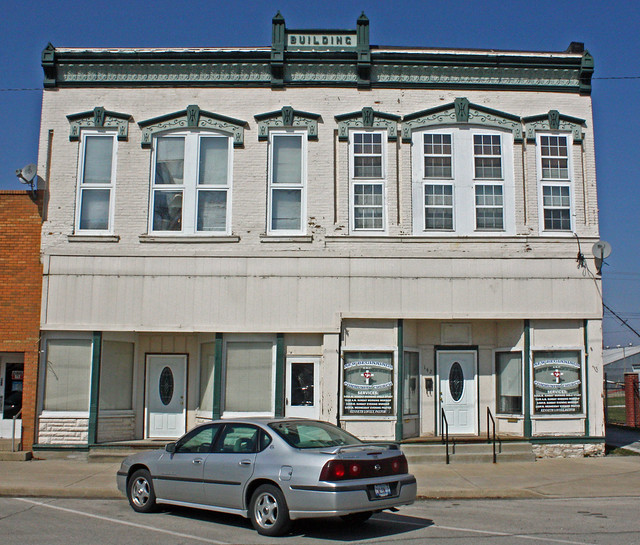 Girard IL - Old Building with Ornamental Sheet-Metal Panels and Cornice Pediment, North Side of Square