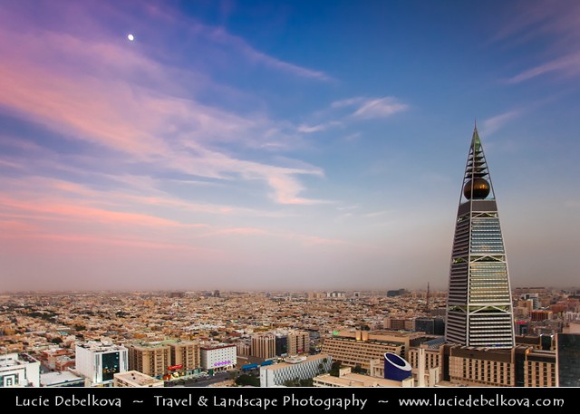 Saudi Arabia - Riyadh - Sunset over Al Faisaliah Tower - 60-story building with a gently curving shape has a restaurant encapsulated in the golden geodesic orb that tops the Tower