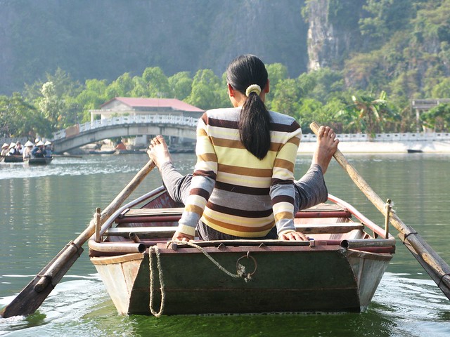Rowing with bare feet - Tam Coc, Vietnam
