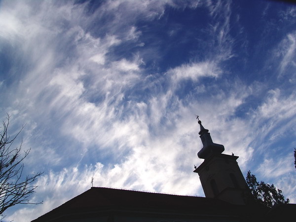 Checea - Church & sharp looking clouds